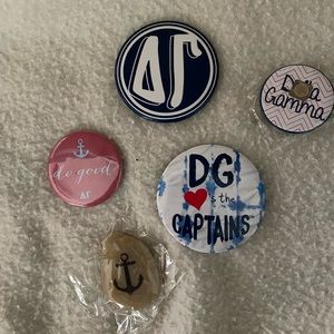 Delta Gamma pins + rock charm